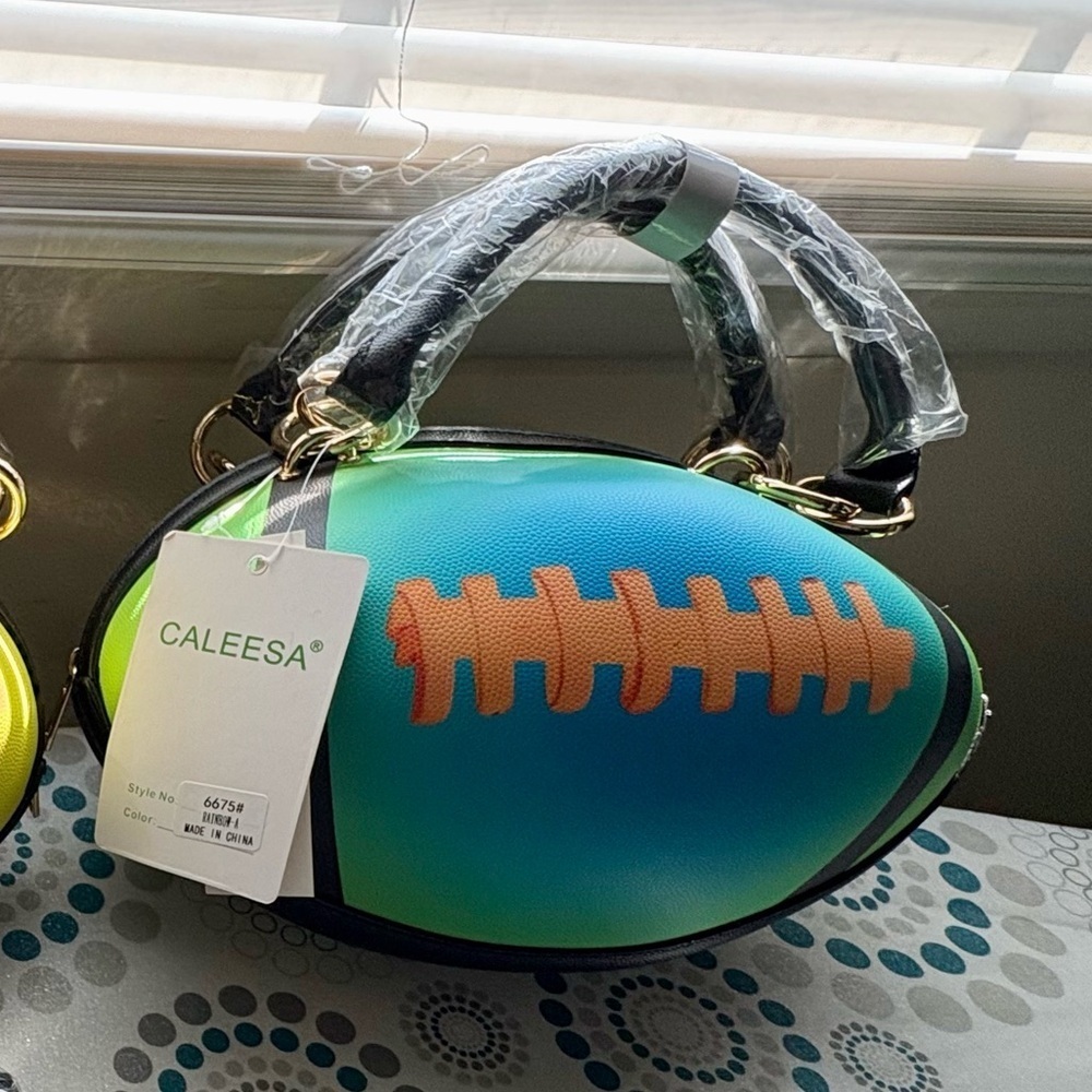 NWT-Rugby Teal & Lime
Whimsical Festival pebble textured football handbag - Picture 7 of 10